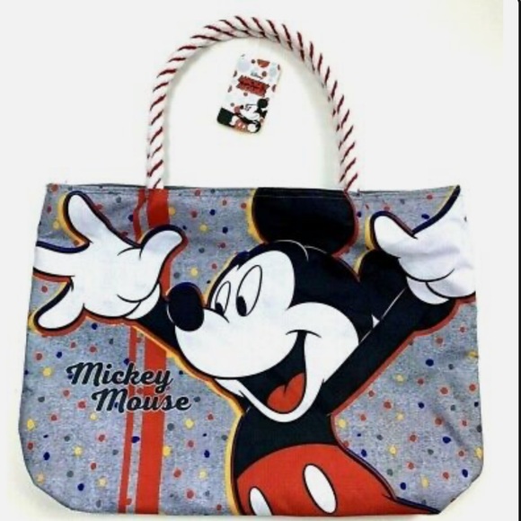 Disney Handbags - Disney Tote with Mickey print and top zipper closure